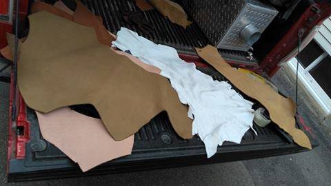 Box of leather trimmings.
